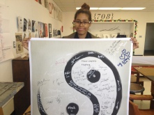 Holding up a project she’s worked with her classmates, Daniela proudly shows her passion for Graphic Design. Working on this year’s senior magazine Document, the class created a poster of the ying-yang symbol to represent the project’s theme of duality. This is simply just one piece of many that displays Gonzalez’s knack for good design.